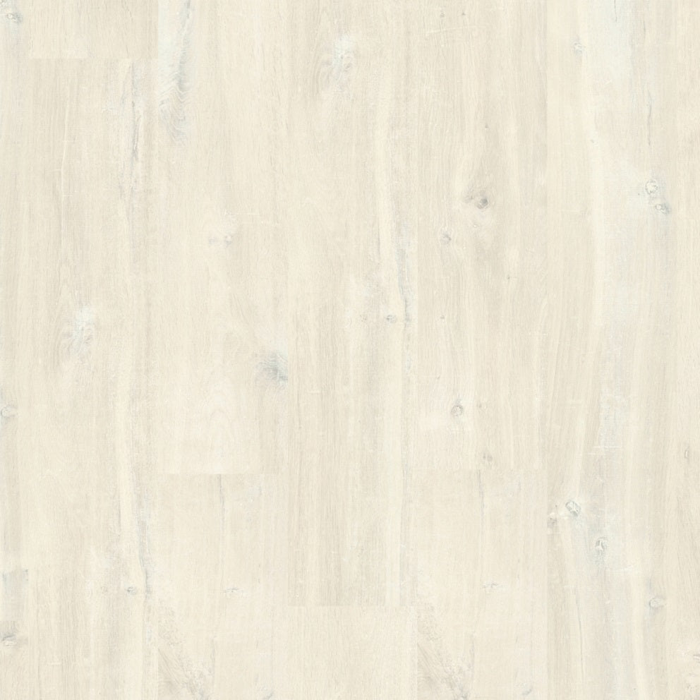 Quick-Step Creo laminate flooring planks showing wood grain texture and natural finish in a close-up view.