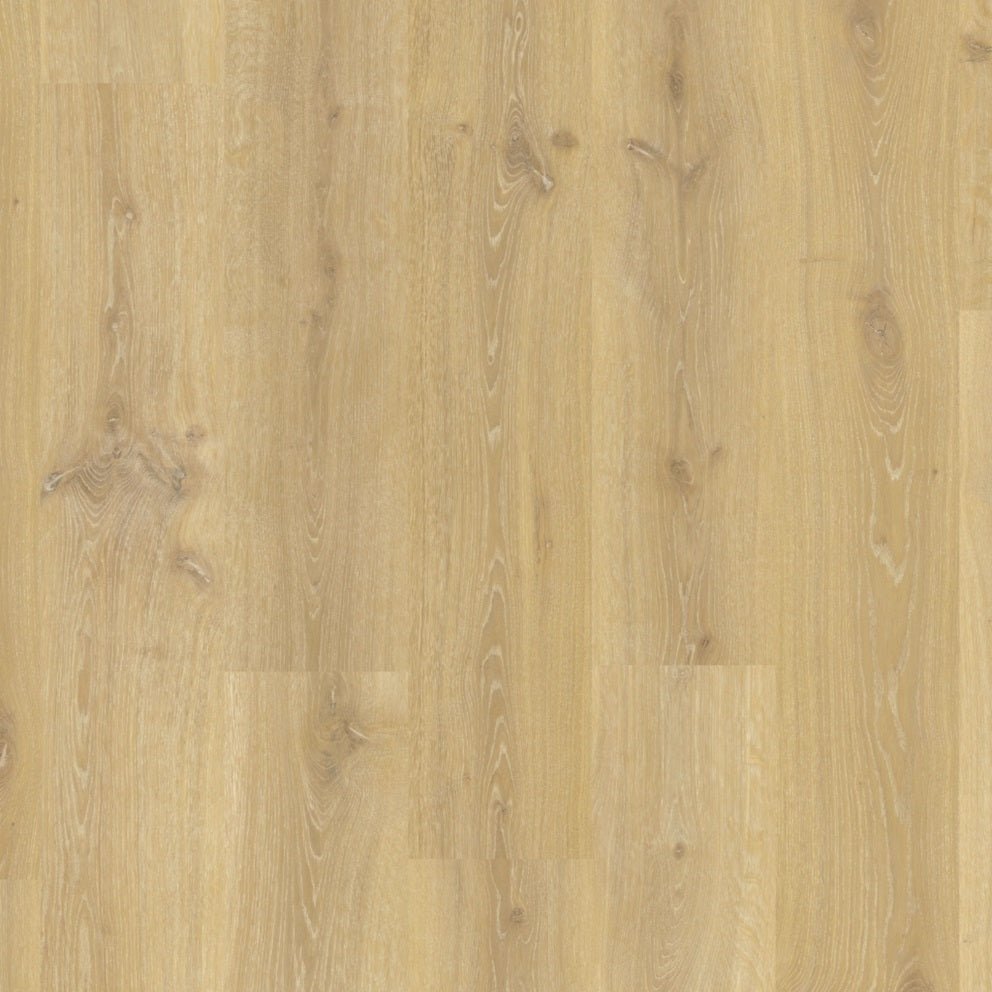 Quick-Step Creo laminate flooring planks in natural wood finish with detailed grain pattern and smooth surface.
