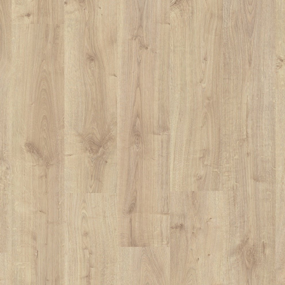 Quick-Step Creo laminate flooring planks in a natural wood finish, showcasing the textured surface and realistic wood grain pattern.