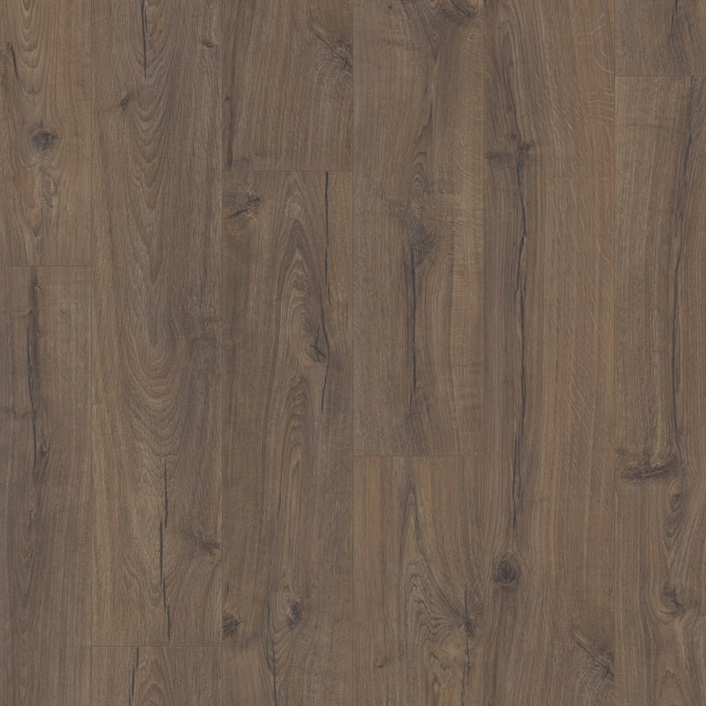 Quick-Step Impressive laminate flooring planks with a wood grain finish, showcasing the durable, stylish flooring surface.