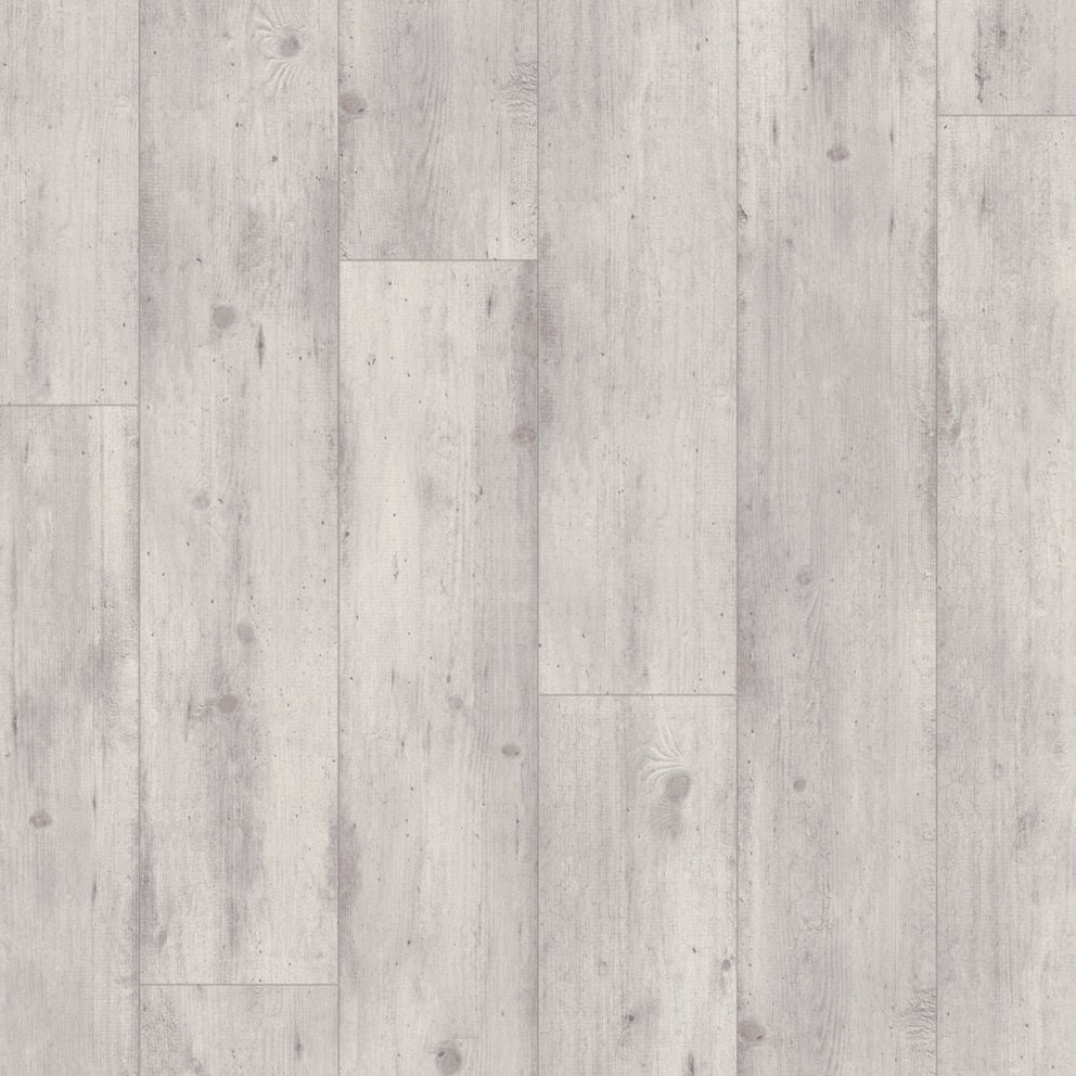 Quick-Step Impressive laminate flooring planks with wood grain texture and light oak finish, showcasing durable flooring for modern interiors.