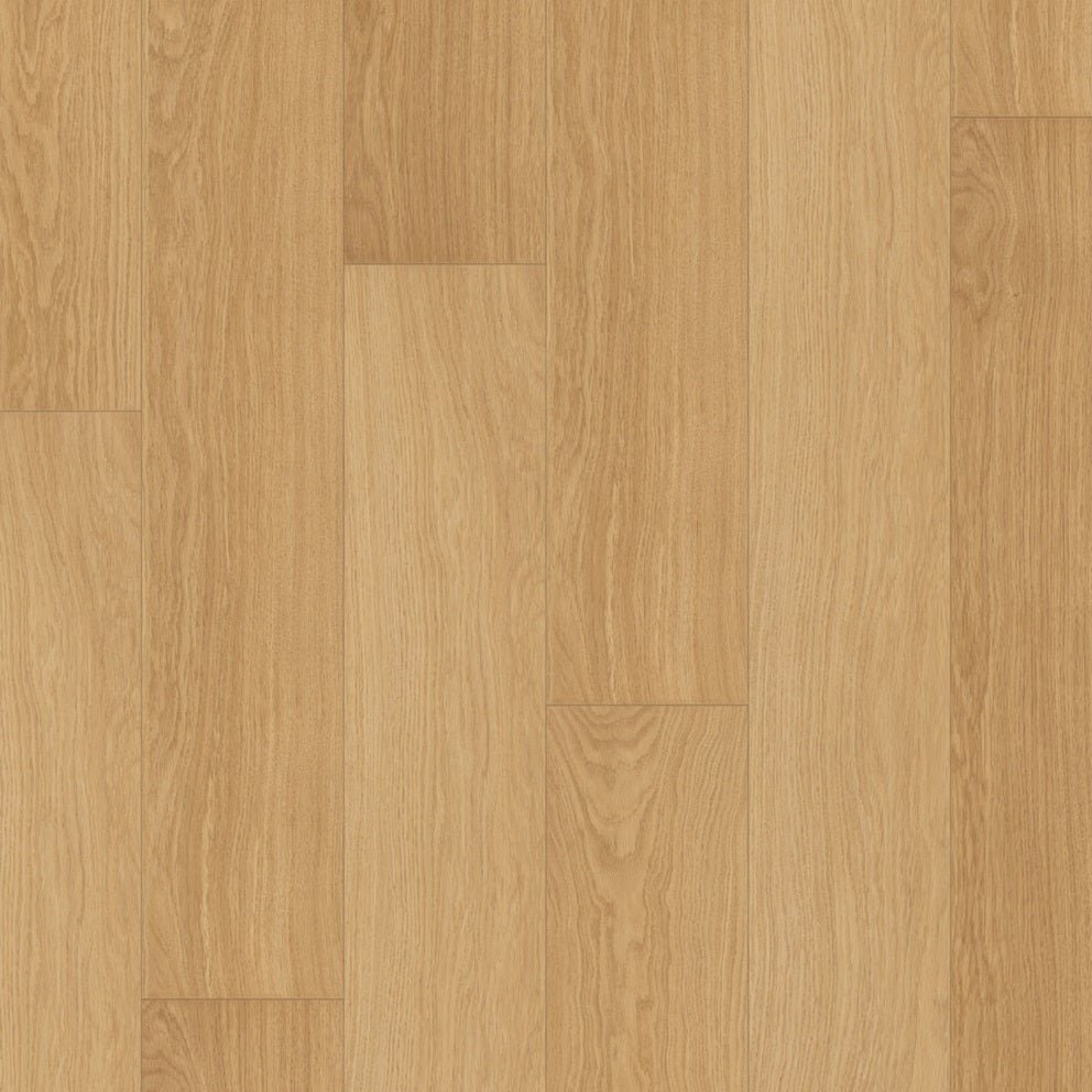 Quick-Step Impressive laminate flooring planks with a natural wood finish and textured surface, showcasing durable flooring installation.