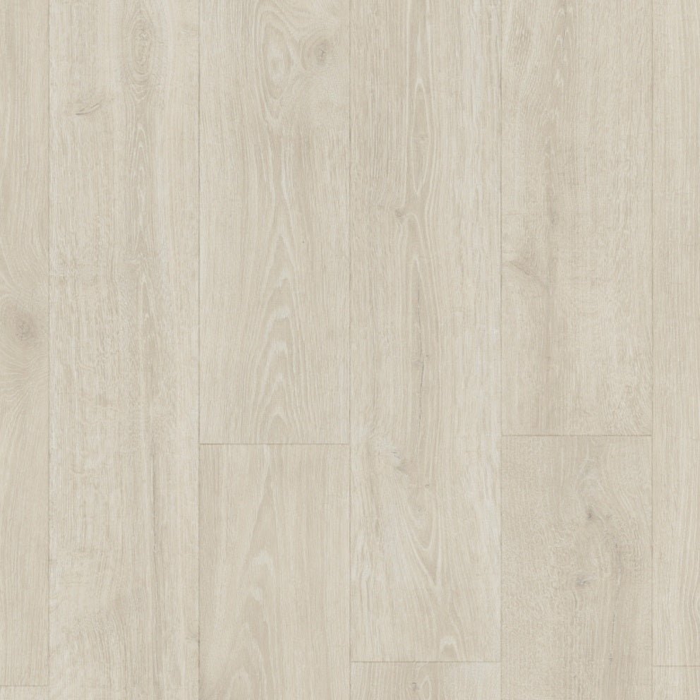 Quick-Step Majestic laminate flooring planks in a warm wood finish, showcasing the durable surface and realistic wood grain pattern.