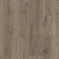 Quick-Step Majestic laminate flooring planks showing natural wood grain and textured surface in a light oak color.