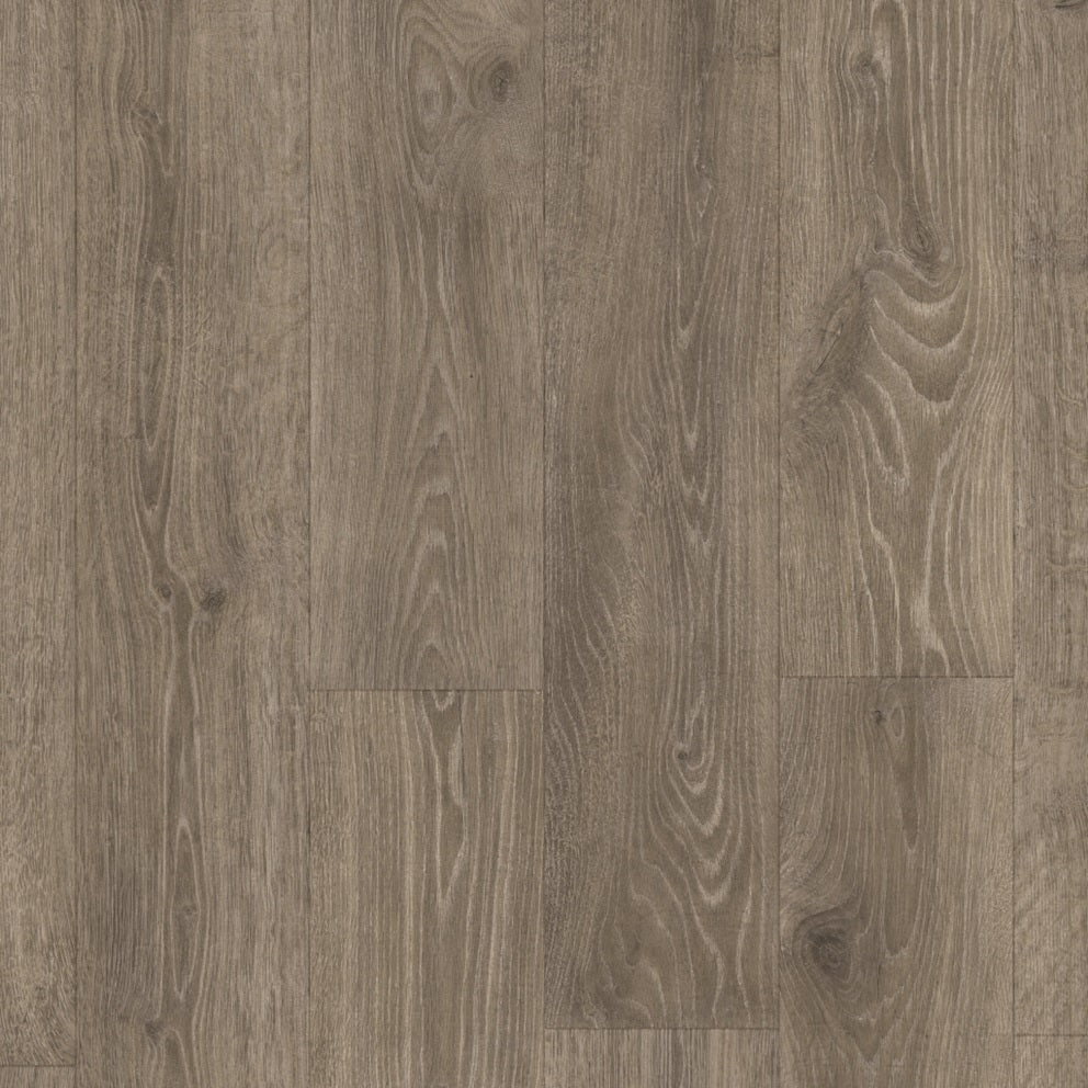 Quick-Step Majestic laminate flooring planks showing natural wood grain and textured surface in a light oak color.
