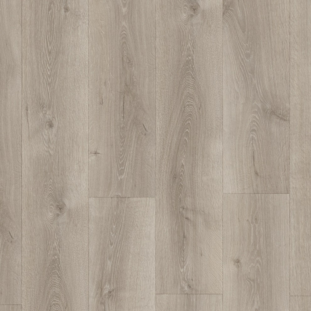 Quick-Step Majestic laminate flooring planks with a wood grain finish, showcasing a natural, durable laminate surface.