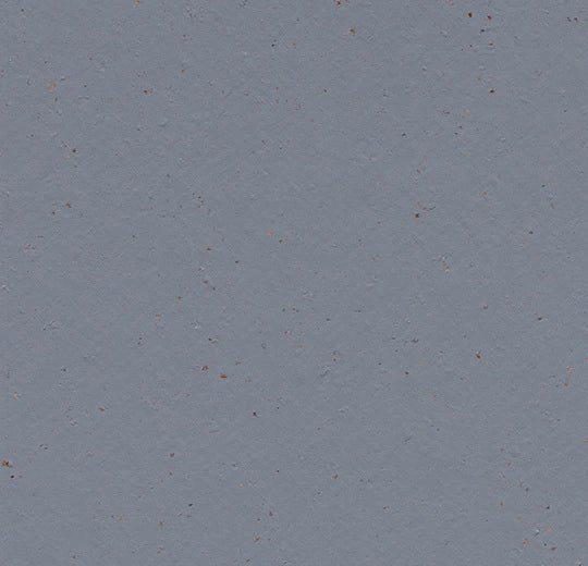 Marmoleum Solid Cocoa linoleum flooring by Forbo showing a close-up of the textured brown surface.