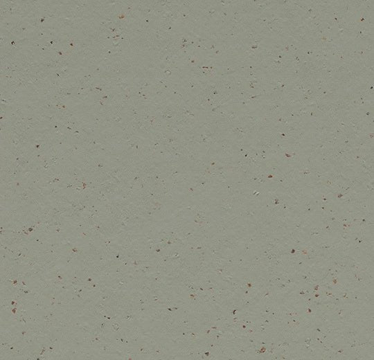 Marmoleum Solid Cocoa linoleum flooring by Forbo, showcasing a natural, textured brown surface suitable for sustainable flooring.