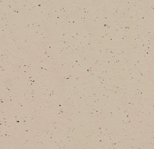 Close-up of Marmoleum Solid Cocoa linoleum flooring by Forbo, showing textured, natural brown surface with subtle patterns.