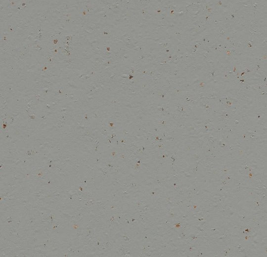 Marmoleum Solid Cocoa linoleum flooring by Forbo showing a close-up of brown textured surface with natural patterns.