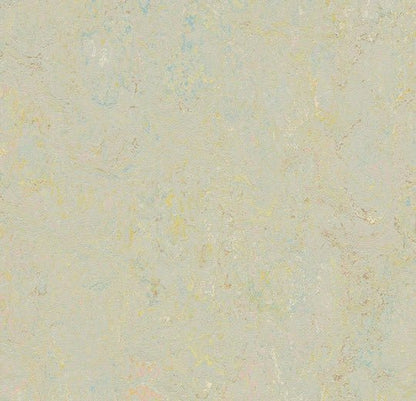 Marmoleum Splash linoleum flooring by Forbo with vibrant, colorful pattern in a close-up view of the textured surface.