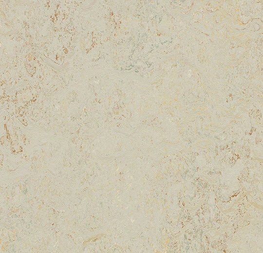 Forbo Marmoleum Splash linoleum flooring with colorful, patterned design in a close-up view showcasing the textured surface.