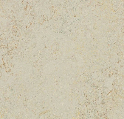 Forbo Marmoleum Splash linoleum flooring with colorful, patterned design in a close-up view showcasing the textured surface.