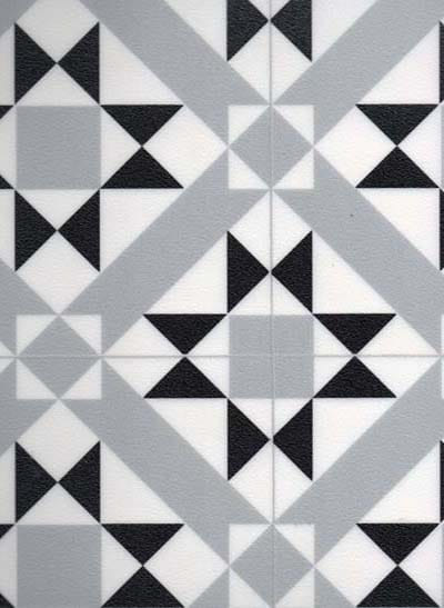 Surefit Carpets Trendtex Geometric Tile Vinyl Flooring with bold pattern and vibrant colors, showcasing durable vinyl surface design.
