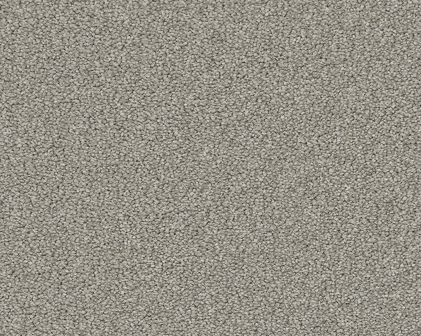 Close-up of Cormar Linwood stain-resistant carpet with textured beige fibers and durable carpet surface.