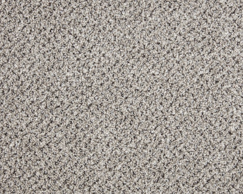 Close-up of Primo Tweed Easy Clean Carpet by Cormar Carpet Co showing textured beige and brown woven carpet fibers.