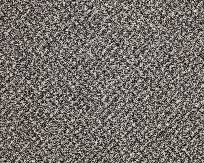 Close-up of Primo Tweed Easy Clean Carpet by Cormar Carpet Co, showing its textured tweed pattern and soft, durable surface.