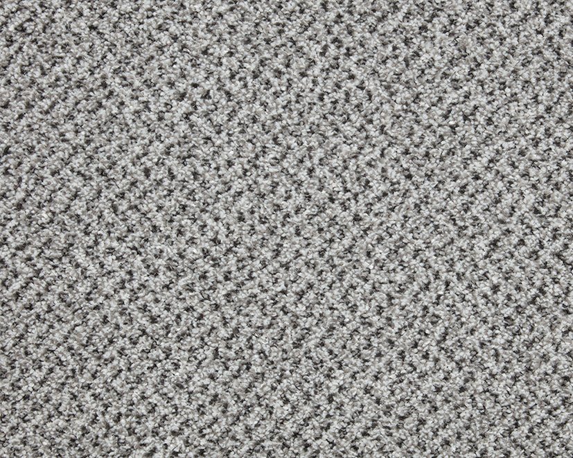 Close-up of Primo Tweed Easy Clean Carpet by Cormar Carpet Co showcasing its textured, durable tweed pattern in neutral tones.