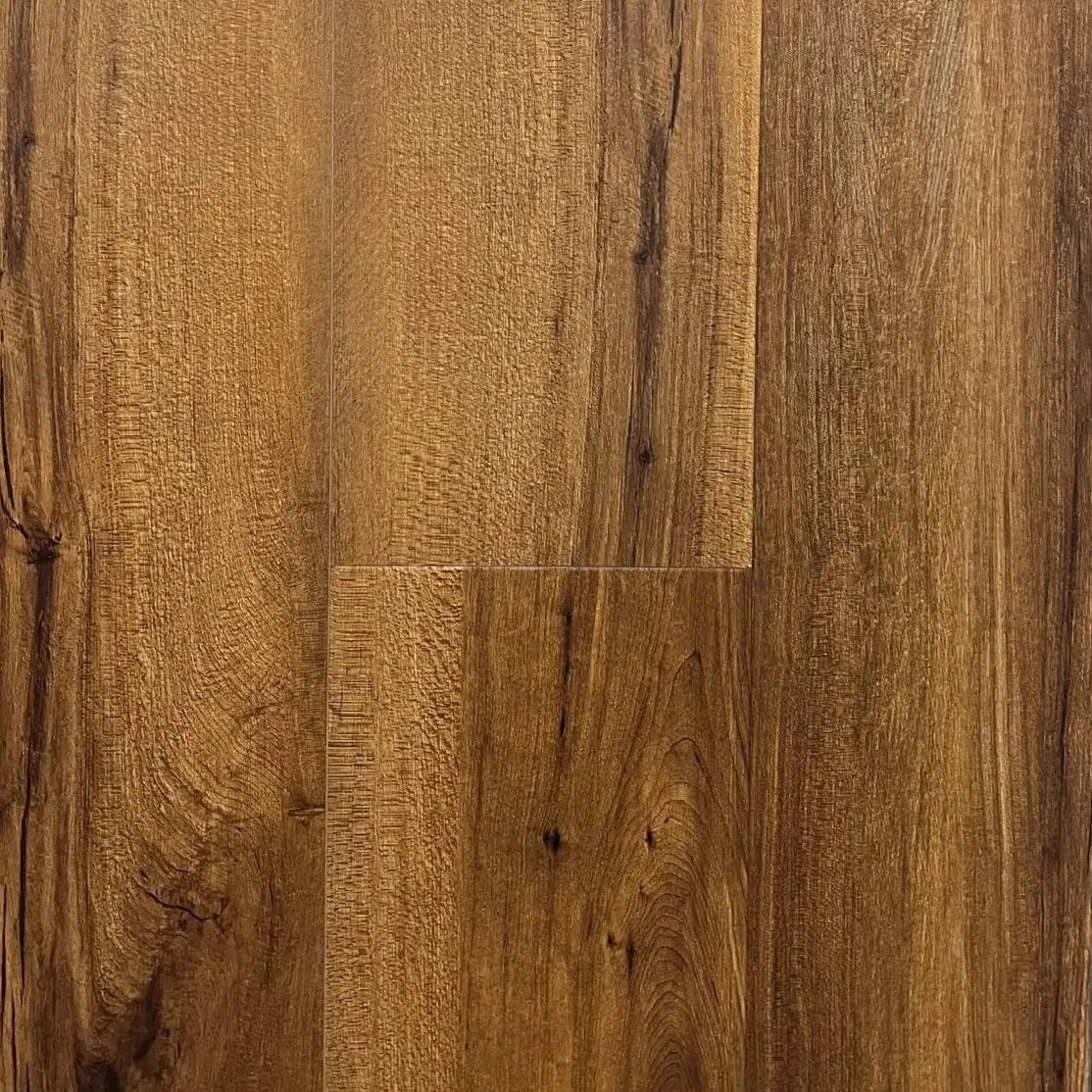 Spire Estyle Symphony Plank LVT flooring with wood-like finish, showcasing the textured surface and natural oak color.