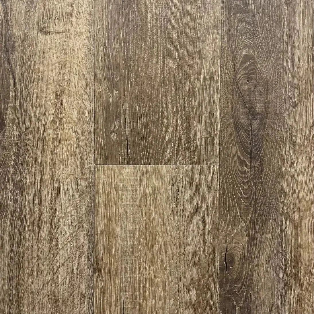 Spire Estyle Symphony Plank LVT flooring showing wood-like texture and natural oak finish in a close-up view.