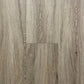 Spire Estyle Symphony Plank LVT flooring with realistic wood grain finish and warm brown tones, showcasing durable luxury vinyl tile planks.
