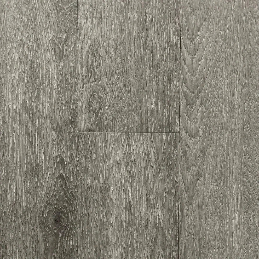 Spire Estyle Symphony Plank LVT flooring with wood grain texture and warm brown finish, showcasing realistic wood planks.