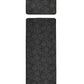 Surefit Carpets Geo Utility Rug featuring a geometric pattern in neutral tones on a textured surface.
