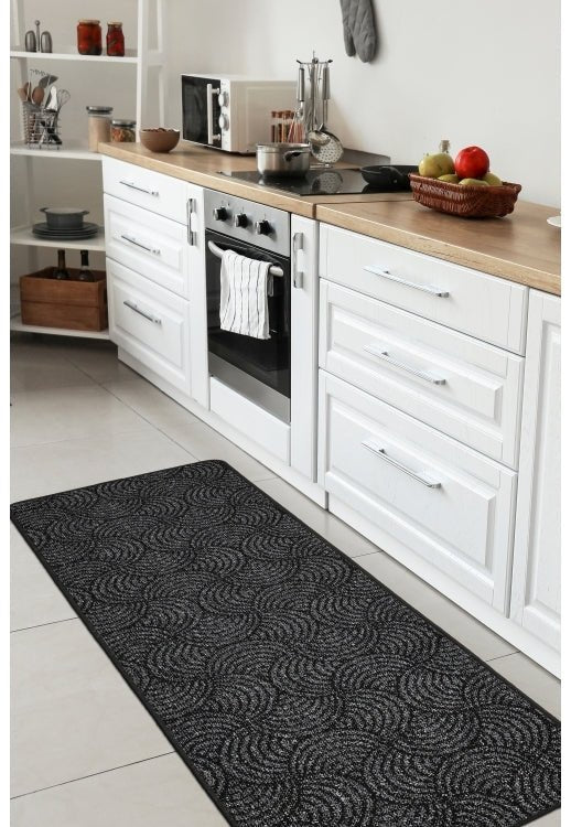 Surefit Carpets Geo Utility Rug with geometric pattern, durable fabric, and neutral colors for modern home decor.
