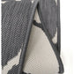 Surefit Carpets Alfresco Reverse Diamond Rug featuring a geometric pattern and textured design in neutral tones.