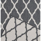 Surefit Carpets Alfresco Reverse Diamond Rug featuring a geometric diamond pattern in neutral tones.
