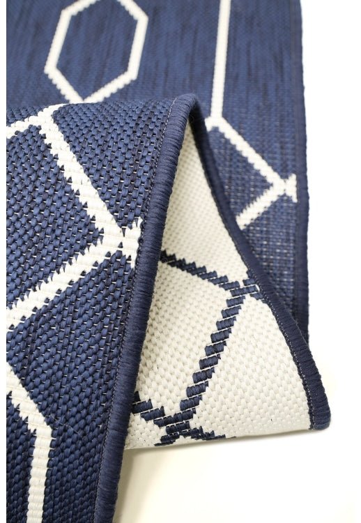 Surefit Carpets Alfresco Reverse Geo Navy Rug showing geometric navy and white patterned rug for indoor or outdoor use.