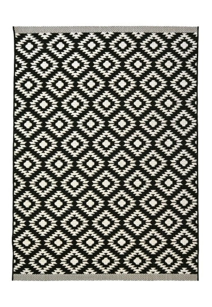 Colorful County Genesis rug by Surefit Carpets with intricate patterns, showcasing a soft, woven textile design.