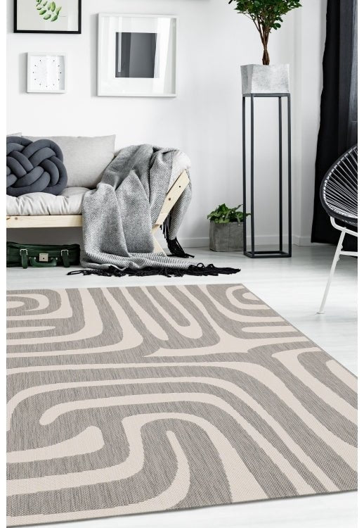 Surefit Carpets County Zebra Rug featuring a black and white zebra print design on soft woven fabric.