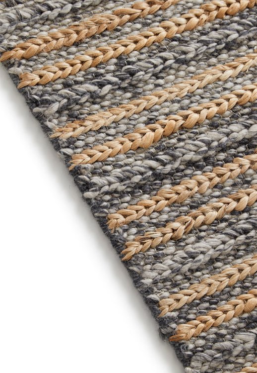 Surefit Carpets Elegance Rug with intricate patterns and plush texture, perfect for adding sophistication to any living space.