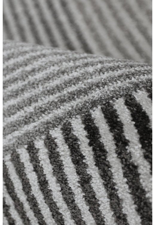 Surefit Carpets Horizon Diamonds rug featuring a geometric diamond pattern in neutral tones for modern home decor.