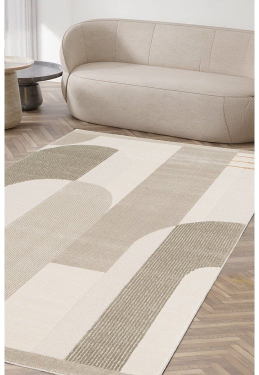 Melrose Milan Abstract Rug with modern geometric design in neutral tones, showcasing a soft, textured surface for contemporary decor.