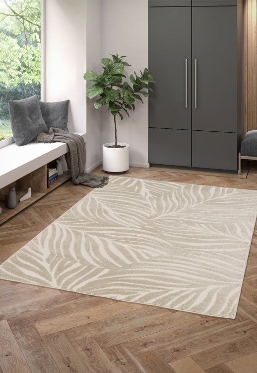 Surefit Carpets Milan Leaves Rug featuring a modern green and beige leaf pattern, soft textured surface, ideal for contemporary living rooms.