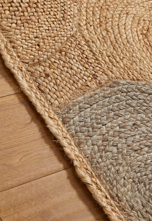 Surefit Carpets Naturals Circle Rug with soft, textured surface and neutral tones, perfect for modern living room decor.