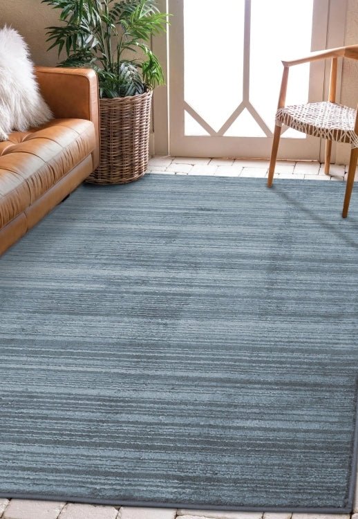 Surefit Carpets Arlo Rug featuring a soft, textured design in neutral tones, perfect for modern living room decor.